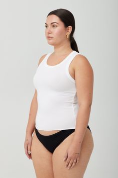 Meet Robin- the modest version of Etta. Robin is our fitted full-length tank with a scoop neckline that's finished with a raw hem. Cut to perfection to hide those sneaky bra straps. It's made from Tencel Lyocell, so it's super soft and buttery, while also having a smoothing affect. A wise choice for when you need a lengthier option. Luxury Essentials, Bra Straps, Scoop Neckline, Cotton Fiber, Grey And White, Heather Grey, Full Length, Cashmere, Organic Cotton