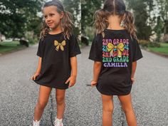 Get ready for the first day of second grade with our Personalized Second Grade Back to School Shirt! 🎒🌟 Make the start of the school year extra special with this adorable and customizable shirt, designed to celebrate your little one's big milestone. Perfect for first day photos, classroom adventures, and new friendships, this shirt is a delightful way to kick off the school year! 🍎 Cute and Comfy Design: Crafted from soft, breathable fabric, this shirt ensures your second grader stays comfort Spirit Jeans, Dance Instructor, Comfort Colors Tee, Girls Birthday, Birthday Shirt, Second Grade, Kids Tops, Oversized Shirt, Orchestra