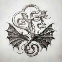 a drawing of a dragon on paper