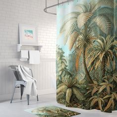 a bathroom with a shower curtain and rugs on the floor