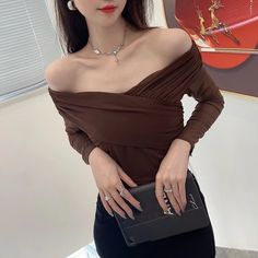 This is perfect for those who are looking for a clothing for a good price. It is fashionable, stylish, and it will look great on anyone who wears it. Do you wanahavit? SIZE S:Bust:74cm,Waist:53cm,Raglan Length:48cm,Length:34cm M:Bust:78cm,Waist:57cm,Raglan Length:49cm,Length:35cm L:Bust:82cm,Waist:61cm,Raglan Length:50cm,Length:36cm Note: 1 inch = 2.54 cm, 1 cm = 0.39 inch note: measurement by hands allow 2-3cm errors which is normal Solid Color V-neck Top For Night Out, Chic V-neck T-shirt For Night Out, Off-shoulder Solid Color Top For Fall, Solid Color Off-shoulder Top For Fall, Stretch Solid Color Party Tops, Brown V-neck Solid Color Top, Brown Solid Color V-neck Top, Solid Color Crop Top For Night Out, Chic Off-shoulder Solid Color Tops