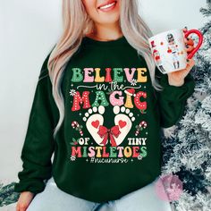 Magic Of Tiny Mistletoe Christmas Shirt, Nicu Nurse Christmas Sweatshirt, NICU Christmas Shirt, Neonatal ICU Nurse Shirt, Xmas Gift For Nicu ❗ Please Note: * Brand may vary based on availability (Gildan, Comfort Colors, Rabbit Skins, Next Level), but all are high-quality and soft. * Brands for some colors and sizes may differ in multiple or mass orders. * Different styles of shirts may have varying shades of the same color due to different manufacturer brands. * The design is printed directly in Nicu Nurse Shirt Ideas, Im A Nicu Doctor Tee Shirt, Nicu Christmas, Nicu Nurse Holiday Shirts, Nicu Shirts, Nicu Shirts Preemies, Mistletoe Christmas, Nurse Christmas, Nicu Nurse