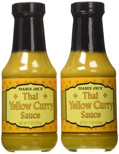 two bottles of thai yellow curry sauce