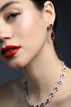 Fantasia by Deserio red CZ teardrop drop earrings. Top 8.5 x 5.5mm, Bottom 19.8 x 6.5mm 14k gold plated sterling silver Red Frock, Red Jewel, Jeweled Earrings, Marissa Collections, Red Jewelry, Red Hot, Gold Plated Sterling Silver, Teardrop Earrings, Fashion Boutique