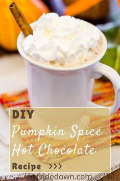 pumpkin spice hot chocolate recipe with whipped cream in a white cup and cinnamon stick sticking out of the top