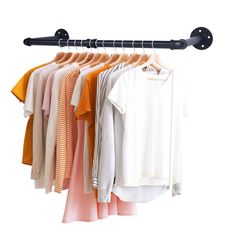 an image of clothes hanging on a rack