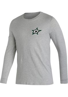 Show off your team pride in this Dallas Stars Grey Jersey History Long Sleeve T Shirt! This Dallas Stars Long Sleeve Tee features a lightweight, cotton material with a crew neckline, long sleeves, and screen printed team graphics. Make sure everyone knows you root for the Stars with this Grey Dallas Stars T Shirt. Go Stars!! Soft hand, ring spun cotton material, Regular fit, Crew neckline, Rib-knit collar, Screen print of team logo on left chest, Screen print of team graphic down right sleeve, M Adidas Cotton T-shirt For Fan Merchandise, Adidas Cotton Tops For Sports Season, Adidas Long Sleeve Cotton T-shirt, Adidas Gray Cotton Tops, Dallas Stars, Hand Ring, Soft Hand, Knit Collar, Screen Print