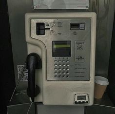 an old fashioned pay phone is on display