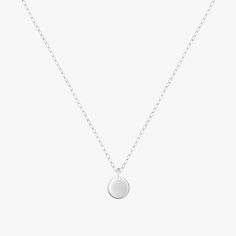 Teeny tiny round disc dangles on a delicate chain choker. Beautiful Minimalist daily wear. Material 14K Gold Filled or 925 Sterling Silver. Nickel free. Suitable for Sensitive Skin. Quantity & Measurement One tiny disc choker Adjustable Length: 12 + 3 inches extension Pendant size: 6mm Silver : 925 Sterling Silver Gold: 14 Karat Gold Filled Handmade with ♥ Minimalist Round Disc Charm Necklace With Adjustable Chain, Minimalist Everyday Charm Necklace With Coin Pendant, Everyday Minimalist Charm Necklace With Coin Pendant, Minimalist Coin Necklace With Adjustable Chain, Minimalist Coin Necklace With Delicate Chain For Everyday, Minimalist Necklace With Delicate Round Disc Chain, Minimalist Round Disc Necklace For Everyday, Simple Sterling Silver Round Disc Necklace, Everyday Minimalist Coin Necklace With Delicate Chain