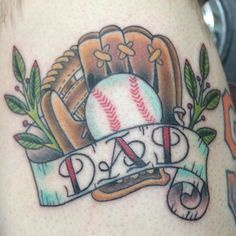 a baseball glove and ball with the word dad on it is shown in this tattoo design