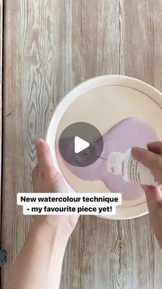 a person is holding a bowl with an image on it and the words new watercolour technique - my favorite piece yet