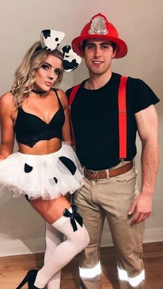 a man and woman dressed up in costumes