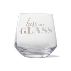 a glass with the words kiss my glass on it