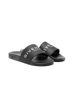 Black logo-print sliders from Givenchy Kids featuring logo print to the front, slip-on style and open toe. | Givenchy Kids Logo-Print Sliders Black Slides With Logo, Black Logo Sandals For Summer, Black Logo Slides, Designer Slides For Summer, Logo Print Slip-on Sandals For Summer, Slip-on Sandals With Logo Print For Summer, Black Designer Sandals With Logo, Summer Slip-on Sandals With Logo Print, Black Slides With Logo For Summer