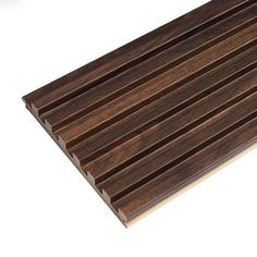 a wooden slatted surface is shown on a white background with no people around it