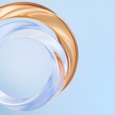 an abstract image of white and gold rings on a blue background with copy - space