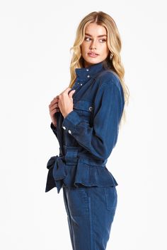 Drop shoulder jacket with front patch pockets and cinched waist. Versatile jacket for anywear is a MUST add to wardrobe! Solid color woven on relaxed fit.Body length from HPS: 23 1/2", Sleeve length: 22", Bust: 44" (Size Small) 100% TENCEL Machine wash cold, Tumble dry low Imported Fall Washed Blue Utility Jacket, Washed Blue Utility Jacket For Fall, Washed Blue Long Sleeve Utility Jacket, Denim Blue Utility Jacket With Flap Pockets, Washed Blue Long Sleeve Outerwear With Flap Pockets, Navy Button-up Utility Jacket With Pockets, Fall Utility Jacket In Washed Blue, Denim Blue Long Sleeve Utility Jacket With Flap Pockets, Blue Long Sleeve Utility Jacket With Pockets