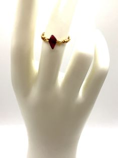 Diamond-shaped Garnet gemstone wire-wrapped on 14K Gold-Fill wire. Each Garnet will have slight shape variations Red Adjustable Wire Wrapped Rings, Adjustable Red Wire Wrapped Rings, Adjustable Gold Ruby Ring, 14k Yellow Gold Wire Wrapped Rings, Elegant Gold Wire Wrapped Crystal Ring, Gold Filled Ring, Ring Sale, Diamond Shaped, Garnet Gemstone