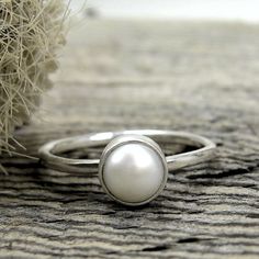 20 Off Today  Code Love20  Pearl Ring  June by LisasLovlies, $58.00 Dainty Sterling Silver Pearl Ring For Everyday, Simple Pearl Ring For Wedding, Delicate Sterling Silver Pearl Ring, Sterling Silver Pearl Drop Ring For Promise, Sterling Silver White Gold Pearl Ring, Sterling Silver Pearl Drop Ring For Promise Occasions, Classic White Pearl Ring With Simple Design, Minimalist Stackable Sterling Silver Pearl Ring, White Gold Sterling Silver Pearl Ring