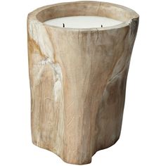 a wooden candle holder that is shaped like a tree stump