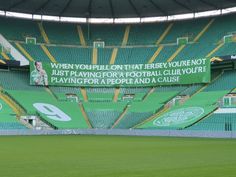 there is a large green field in the stadium