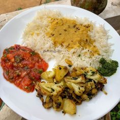 a white plate topped with different types of food