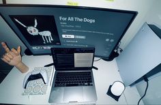 an open laptop computer sitting on top of a desk