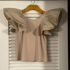 Darling Ruffle Sleeve Crop Tee! Looks Cute With Literally Anything!! Beige Cotton Ruffle Tops, Trendy Beige Tops With Ruffles, Trendy Beige Ruffled Tops, Beige Cotton Tops With Ruffles, Casual Beige Top With Ruffles, Crop Tee, Bucket List, Womens Tops, Crop Tops