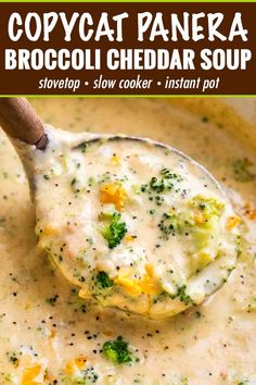 broccoli and cheese soup in a bowl with a wooden spoon