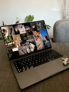 an open laptop computer sitting on top of a table