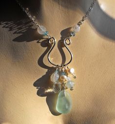 Charmed Sea Glass -- or anything else for that matter.  Great pendant idea. Beachglass Jewelry, Charm Holder, Beautiful Sea, Wire Pendant, Jewellery Ideas, Sea Glass Necklace, Cool Necklaces, Sea Glass Jewelry, Beach Glass