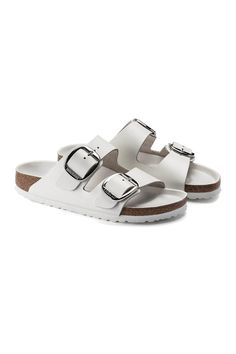 Perfect for anytime of the year, these Birkenstock Arizona Big Buckle Sandals for Women in White, will walk you right into any season. We have mega heart eyes for the large, elegant buckle creating a bold yet minimalist design! These shoes pair perfectly with any outfit, so make sure you get them before their gone! Features: Birkenstock Style: 1021583 Color: White Women's sandals Upper: natural leather Insole: Piumato leather Footbed: EVA EVA outsole Anatomically shaped cork-latex footbed Two st Birkenstock Arizona Big Buckle, Arizona Big Buckle, Birkenstock Style, Women In White, Casual Shoe, Buckle Sandals, Birkenstock Arizona, Heart Eyes, Sandals For Women