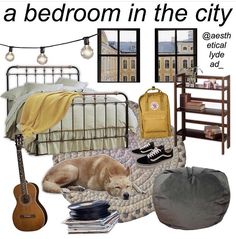 there is a bed room in the city with a guitar, bookshelf and other items