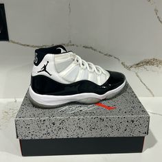 Jordan 11 Retro Concord 2018 Size:9 M Condition: Pre Owned (Like New) Color: Black And White White Low-top Basketball Shoes With Contrast Sole, White Jordan Shoes With Contrast Sole For Streetwear, Modern White Low-top Jordan Shoes, White Mid-top Basketball Shoes With Air Cushioning, White Low-top Basketball Shoes With Branded Heel Counter, White Basketball Shoes With Contrast Sole, White Basketball Shoes With Contrast Sole For Sports, White Synthetic Basketball Shoes With Abzorb Midsole, White High-top Custom Sneakers With Cushioned Footbed