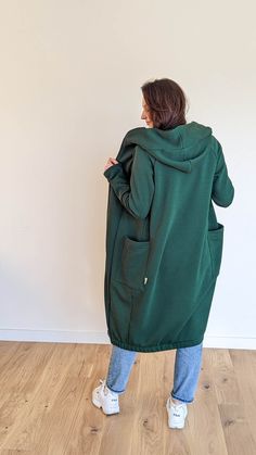 It is super comfortable hooded jacket for everyday life. ◈ It has long zipper which unzips from both sides. So it is very comfortable not just for walking, but also for sitting and driving. ◈ It also has big pockets and one inside pocket for small items or phone. ◈ Big and warm hood. The hoodie will be handmade with a lot of care in our little family studio especially for you after receiving your order. We hope this hoodie will be your favorite outwear not for one season. We believe in slow fash Everyday Outerwear With Double-lined Hood, Everyday Solid Outerwear With Double-lined Hood, Long Cotton Parka With Pockets, Cozy Hoodie Outerwear With Pockets, Cotton Long Coat Parka With Pockets, Cozy Everyday Hoodie Outerwear, Hooded Cotton Sweater Coat For Winter, Hooded Outerwear With Pockets For Everyday, Cotton Hooded Long Coat For Fall