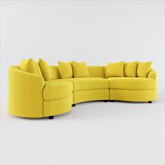 a large yellow sectional sofa with pillows on the top and bottom corner, in front of a white background