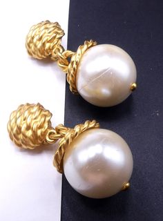 "Vintage marked AK gold tone and faux pearl clip drop earrings, In good vintage condition, One of pearl with scratch line. It's 2\"long. The faux pearl 7/8\" across. Thanks." Formal Gold Pearl Drop Clip-on Earrings, Formal Dangle Pearl Clip-on Earrings, Vintage Gold Earrings With Pearl Charm, Vintage Gold Pearl Clip-on Earrings, Formal Gold Clip-on Earrings With Pearl Drop, Gold Pearl Drop Clip-on Earrings For Formal Occasions, Vintage Gold Pearl Drop Earrings, Gold Clip-on Pearl Earrings, Pearl Necklace Set