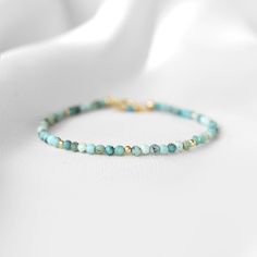 "This hand made bracelet showcases a stunning selection of genuine Turquoise gemstones. This makes a wonderful gift for someone with a December birthday, or any Turquoise lover in your family or friend circle. All jewelry will arrive in an elegant, ready-to-gift drawstring pouch within a gift box. To find your bracelet size, simply measure the circumference of your wrist by wrapping a string around it and measuring the length of the string. If you are shopping for someone else and are unsure of Adjustable Gemstone Bracelet, Turquoise Beaded Bracelets, Friend Circle, December Birthstone Jewelry, Stone Bead Jewelry, Main 1, Healing Gemstone Bracelets, December Birthday, Turquoise Bead Bracelet