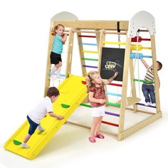 three children playing on a wooden play set with chalkboard and slide in the background