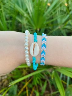 This beachy coastal set comes with 3 bracelets. You can buy them separately or together as a set! Each bracelet is around 6 inches, please message me if you need a smaller or larger size. Trendy Beaded Bracelets For Beach Season, Trendy Friendship Bracelets For Beach Season, Trendy Strand Friendship Bracelets For Beach Season, Casual Beaded Wrap Bracelet For Beach, Trendy Colorful Beaded Friendship Bracelets For Beach Season, Casual Beach Wrap Bracelet With Colorful Beads, Trendy Blue Braided Bracelets For Vacation, Trendy Bracelets With Colorful Beads For Beach Season, Trendy Colorful Beads Bracelets For Beach Season