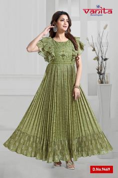 A full-length green kurti designed for special occasions. This Anarkali-style kurti is meticulously tailored in chinnon fabric, creating a crushed finish. The yoke portion is subtly accentuated with thread embroidery, and ruffle sleeves add a stunning touch. The skirt portion has a flowing appearance with delicate pleats. The kurti is embellished with scattered zari buttis, giving it an elegant party-ready finish. The border imparts a festive look to the attire.  Note: Colors may slightly vary d Eid Green Floor-length Maxi Dress, Green Floor-length Maxi Dress For Eid, Green Maxi Length Kurta For Eid, Green Straight Kurta Dress For Eid, Maxi Length Green Kurta For Eid, Green Maxi Dress For Festive Occasions, Green Fitted Maxi Dress With Flutter Sleeves, Green Straight Kurta Dress For Diwali, Green Georgette Straight Kurta Dress