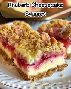 two pieces of rhubar cheesecake squares on a white plate with the words rhubar cheesecake squares above it