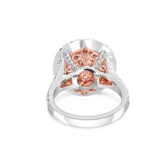 Discover the epitome of luxury with our Rare Sri Lankan Unheated 5.31 Carats Padparadscha Sapphire and Diamond Ring. Crafted with precision and passion, this ring boasts a vibrant Padparadscha Sapphire, known for its rare pink-orange hue. Adorned with sparkling diamonds, experience elegance and exclusivity like never before. Luxury Gia Certified Round Halo Ring, Luxury Rose Gold Rings With Halo Setting, Luxury White Sapphire Ring With Halo Setting, Luxury Ruby Ring With Halo, Luxury Gia Certified Moissanite Halo Ring, Luxury Round Diamond Ring With Halo Design, Luxury Round Halo Design Diamond Ring, Luxury Halo Design Round Diamond Ring, Luxury Rose Gold Round Cut Halo Ring