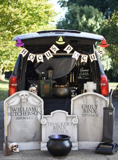 a van is decorated with tombstones and decorations