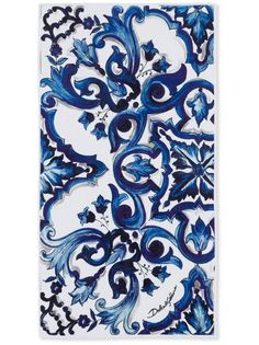 an artistic blue and white tile design