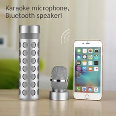 the karaoke microphone, bluetooth speaker and iphone are sitting next to each other