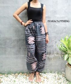 "The harem style trousers made from cotton fabric 100%with an elasticated smock waist and ankles they provide a comfortable lightweight fit, perfect for casual wear, festivals, yoga, holidays as well as pairing with a plain top to get that popular look. Materials: Soft Cotton Sizing: One size fits most. Size : (inches) ✿Waist : 22-42 inch ( 55-106 cm ) ✿ Hip :up to 49 inch ( 124 cm) ✿ Length 40\" ( 101 cm ) ✿2 sides pockets S I Z E : US SIZE 4 - 12 , UK SIZE 8 - 16 , EU SIZE 36 - 44 MODEL SIZE : Casual Harem Parachute Pants For Loungewear, Casual Harem Parachute Pants For Yoga, Casual Cotton Harem Pants For Yoga, Casual Cotton Harem Parachute Pants, Casual Cotton Parachute Pants For Festival, Casual Harem Pants For Festivals, Casual Summer Harem Parachute Pants, Casual Festival Harem Pants, Bohemian Cotton Harem Pants With Tapered Leg