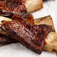 barbecue ribs and french fries on wax paper