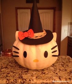 a hello kitty pumpkin sitting on top of a counter