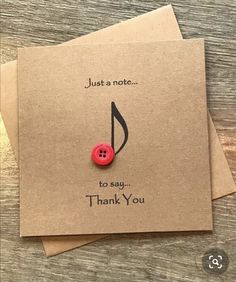 two thank you notes with a red button on top of one that says, just a note to say